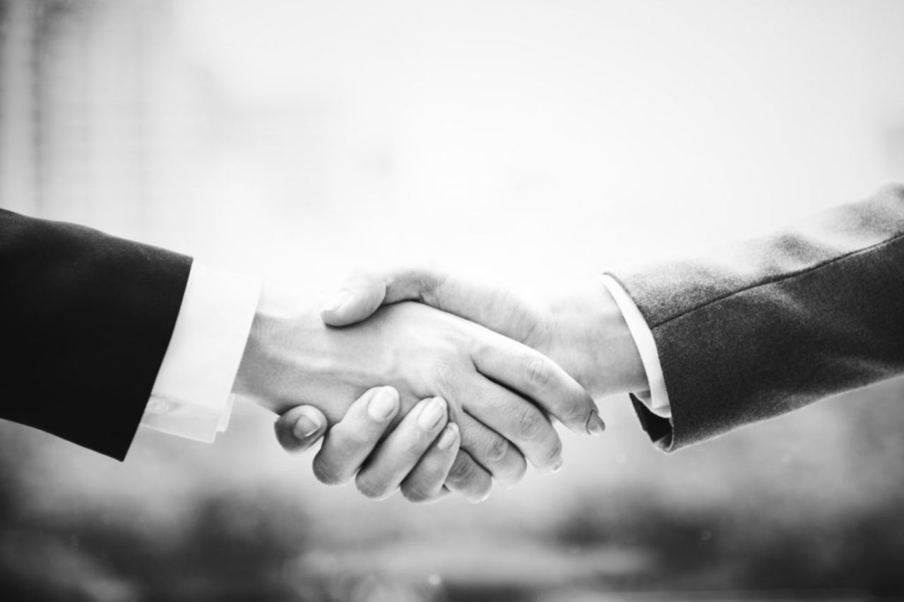 grayscale-business-handshake