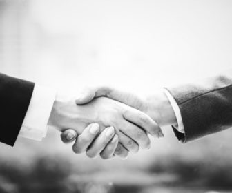 grayscale-business-handshake