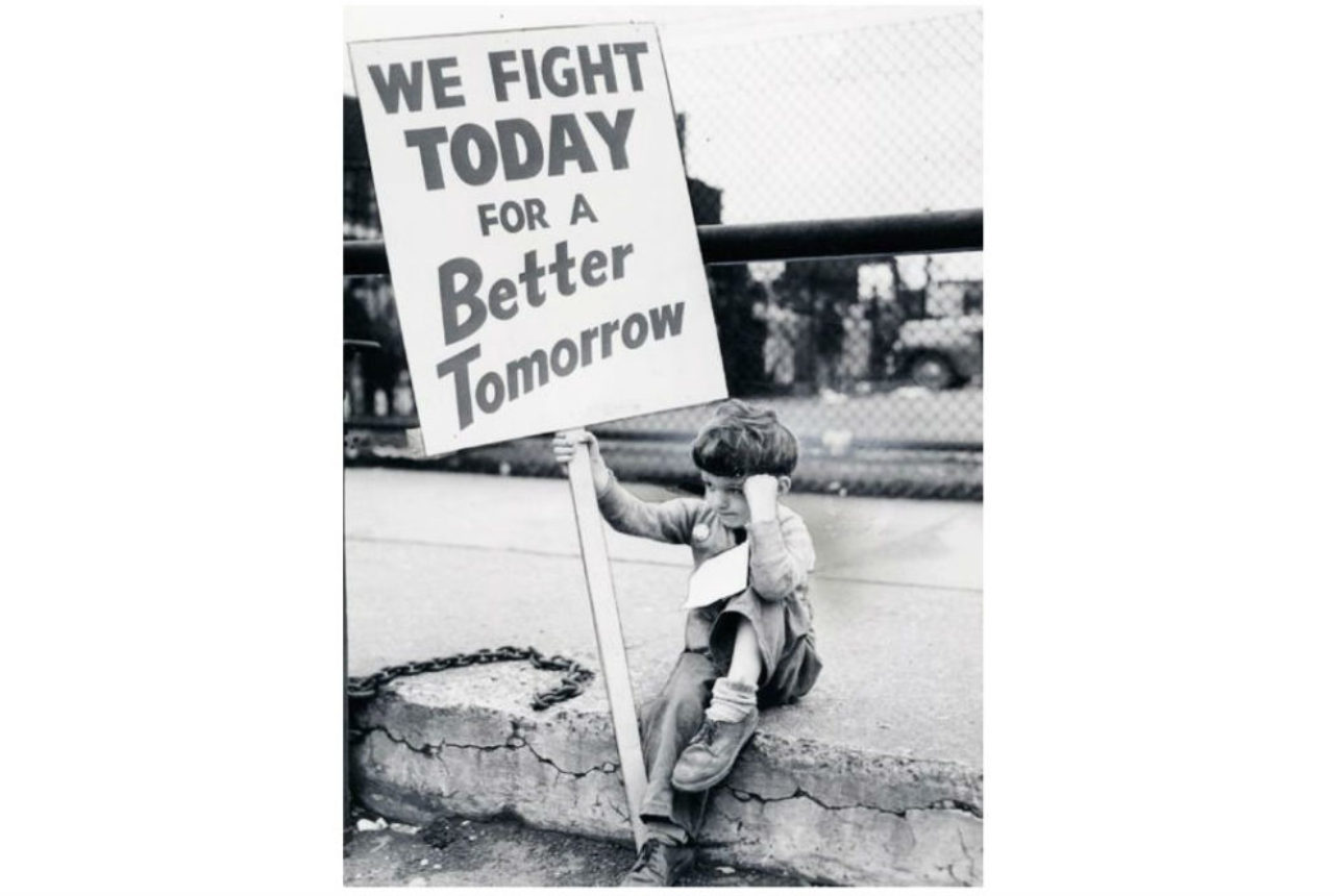 we-fight-today-for-a-better-tomorrow-child-with-auto-strike-sign-1948