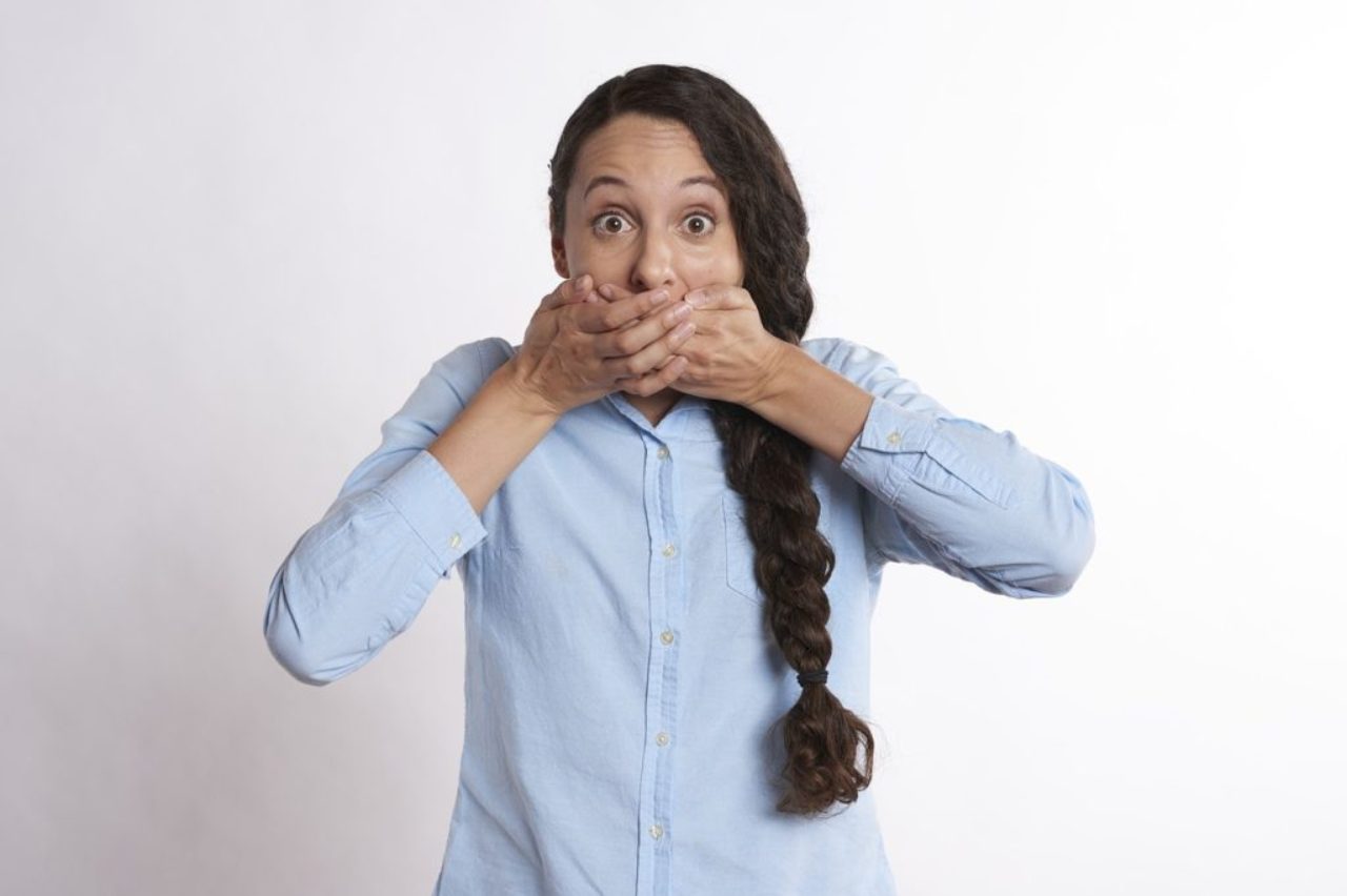 women-covering-mouth-with-both-hands-surprised-expression-secret-2681508_1280