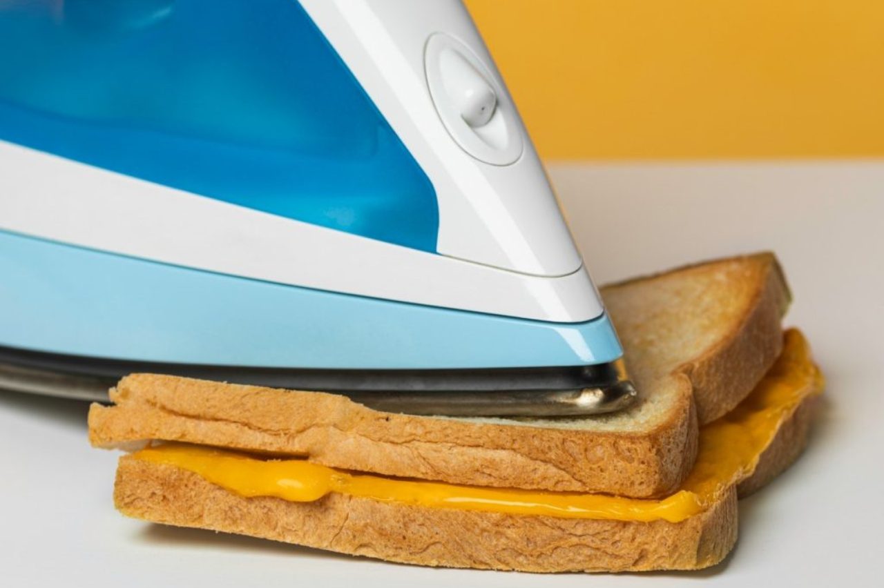 white-and-blue-steam-iron-on-grilled-cheese