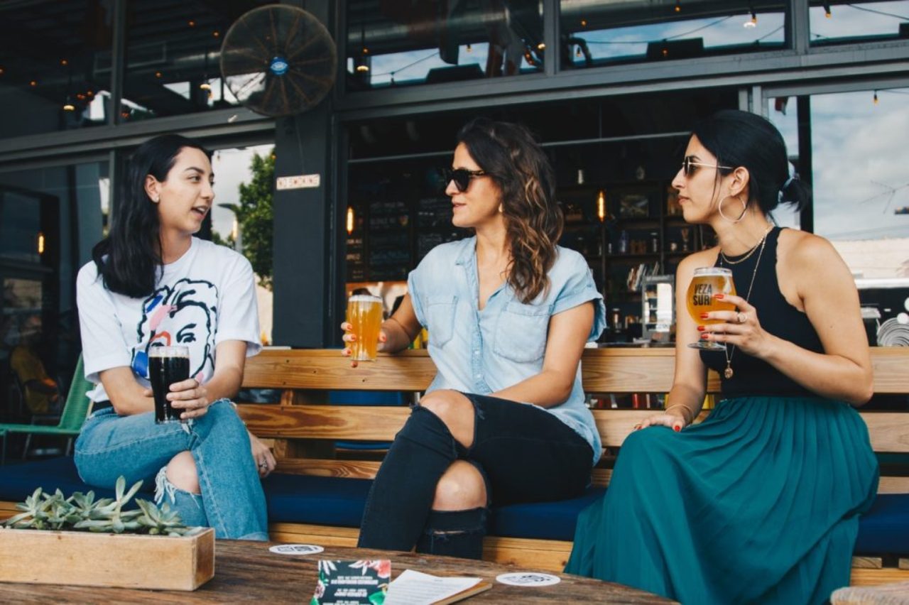 three-women-holding-clear-glasses-1267699