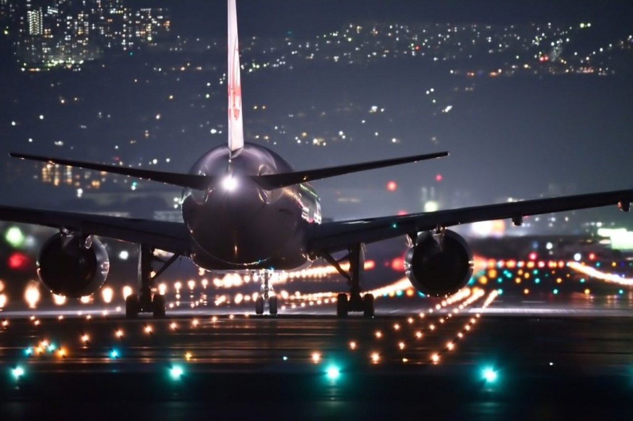 night-flight-plane-landing-at-airport