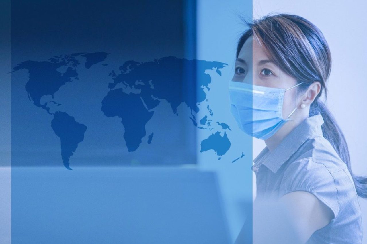 female-wearing-face-mask-with-blue-world-map-background-coronavirus-china-covid-19