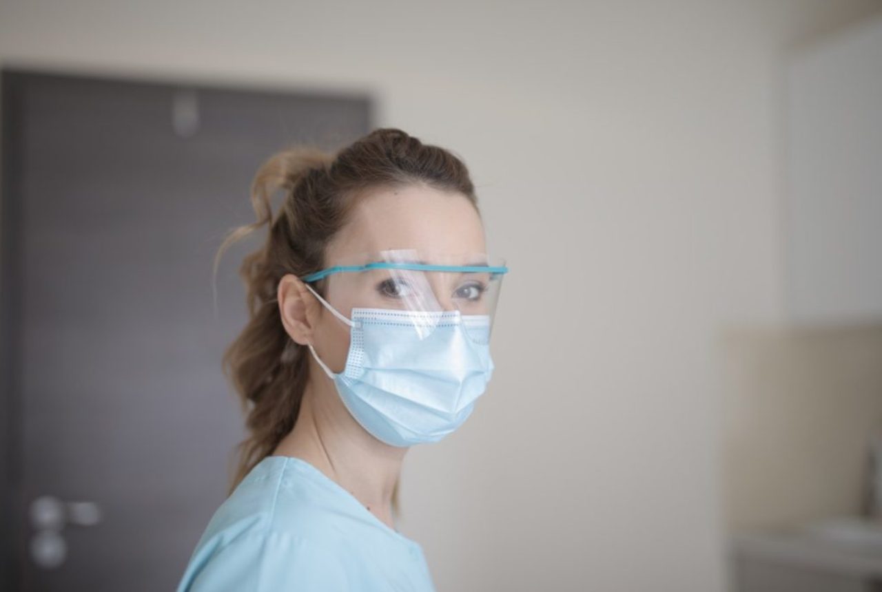 woman-in-blue-shirt-wearing-face-mask-3881247